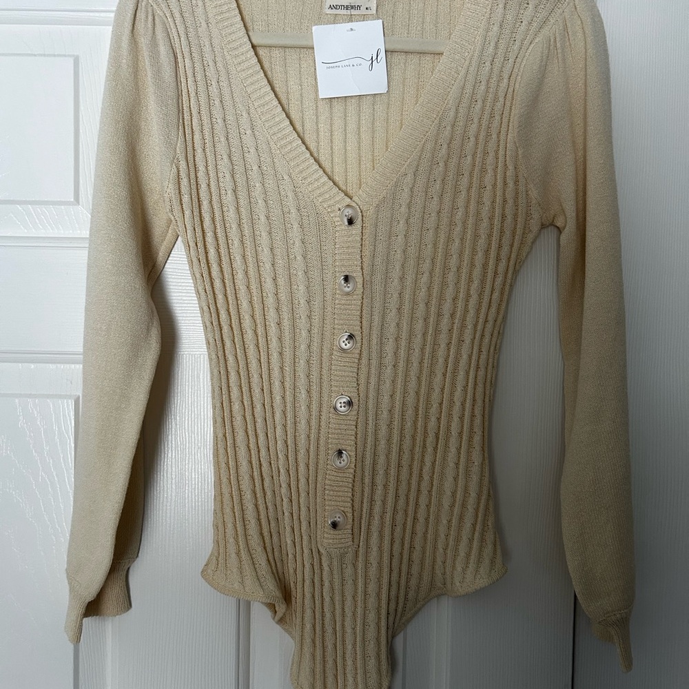 Ribbed V-Neck Button Bodysuit in pale yellow